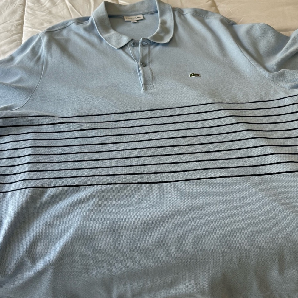 Lacoste Men's Polo Shirt in Light Blue with Navy Stripes - Size 9 XXL.